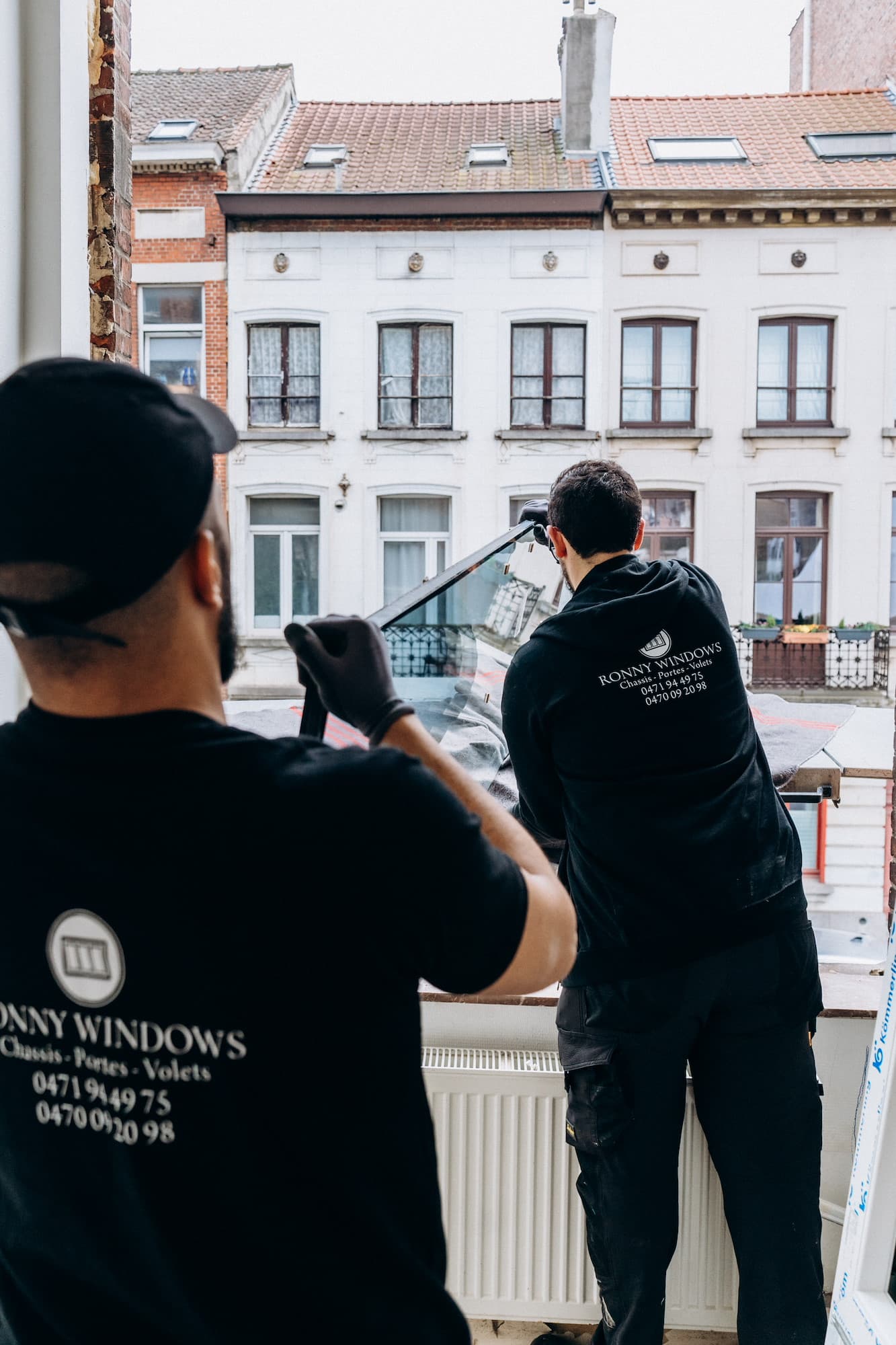 Équipe Ronny Windows sur chantier de réparation
